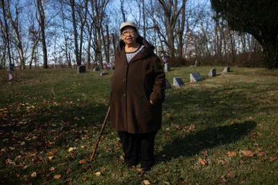 Janis Ivory in the cemetery where her parents are buried in Rendville, OH where she grew up. Janis, her brother Harry and others are working to revitalize the old coal town.